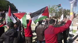 Palestinians take part in a protest against Israel's land control in the Negev desert and to demand the legalisation of the unrecognised villages there in the Palestinian Bedouin village of Khan al-Ahmar