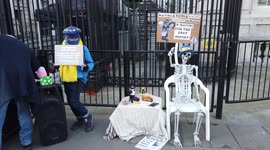 Protesters place skeleton outside Downing Street to mock PM and the long wait for 'partygate' report