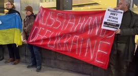 Protesters chant “Russia hands off Ukraine” outside Russia Today building in London as tensions between Russia and Ukraine rise