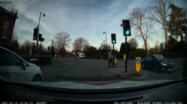 J Walker Ignores Traffic and Crosses Junction without a care