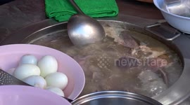 Locals eat street food during Chinese New Year in Bangkok, Thailand