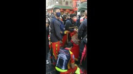 Chinese get ready to celebrate Chinese New Year in Chinatown in London. Its the year 9f the tiger and a large colourful tiger will be paraded through Chinatown in London..