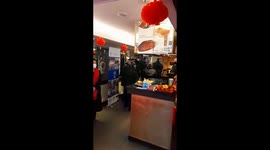 Chinatown, London. Police gather in chinese restaurant to enjoy the Chinese New Year celebrations in the Year of the Tiger.