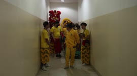 Lion dance group performs during Chinese Lunar New Year at Shopping Center in Palembang, Indonesia