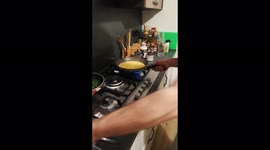 It's all in the wrist! Lad's funny frittata flip fail