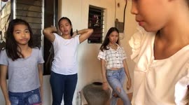 The sisters are at it again with some family choreography in the Philippines