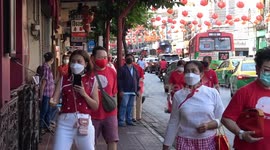 Local wear red dresses while celebrating Chinese New Year in Bangkok, Thailand