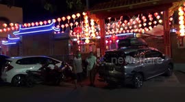 CARE FOR DIVERSITY AT Chinese New Year, Muslim women in Padang dance in the temple