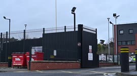 Police Service of Northern Ireland (PSNI) car leaving a Police Station on an emergency call