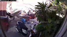 Truck smashes through woman's front yard in Thailand