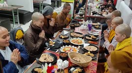 The Buddhist monk and nons praying for food in Northern India