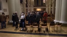 Participants of Save Notting Hill Police Station Site public meeting socialise at St Johns Church at the end of discussion