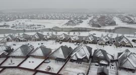 Drone footage shows heavy snow slamming sub-freezing Texas