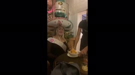 Birthday girl! Eating cake, ice cream, wearing a silly hat. Having a blast.