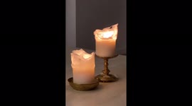 Beautiful, cozy candles on candlesticks. Took this over Christmas. Candlelit atmosphere, super relaxing!