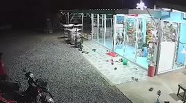Boy bangs his head on glass door of convenience store