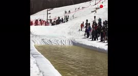 'Nordic skier's pond-skimming stunt goes OFF THE RAILS '