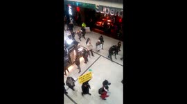 Anti-vax protesters march through Manchester's Arndale Centre
