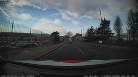 Crazy Driver with Bonnet up on car whilst driving and xannot see.