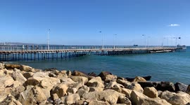 Limassol pier. Wave after the storm. Sea after a storm in sunny weather.