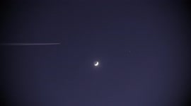 ISS space station meets airplane above moon