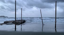 Storm on the beach of Cyprus. The beach flooded. Winter Cyprus.