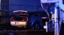 Woman led police on a wild high speed chase that ended after she drove onto train tracks