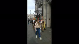 Clowns in Whitehall, London. Clowns and jokers spotted walking near Whitehall in London.