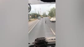 Loose wheel flies across road after coming off truck