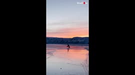 ''Setting Ice on Fire' Figure skater shows off stunning moves while performing on frozen lake'