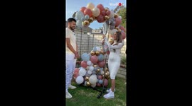Medical practitioner reveals baby's gender using IV drip bag