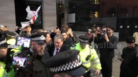 HD FOOTAGE: Sir Keir Starmer escorted by police while chased away by protesters in New Scotland Yard