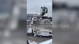 Awesome machine for de-icing plane wings at Heathrow Airport