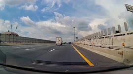 Loose wheel flies into car's bumper and smashes it on motorway in Thailand