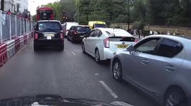 Instant karma as distracted driver angrily overtakes and immediately crashes