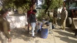 Cops seize illicit liquor from underground pits in central India