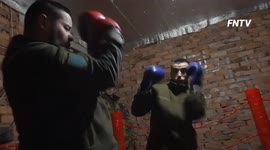 Ukrainian soldiers on frontline train for war in the boxing ring
