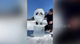 Chinese man sculpts panda mascot for the Winter Olympics out of ice block