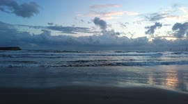 Storm at sunset, clouds hanging over the sea. Cyprus, Limassol.
