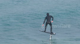 Foil surfer perfectly demonstrates new sport as he glides through Cornish waves
