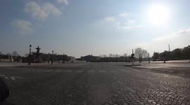 Cyclist cruises deserted streets in Paris during March 2020 lockdown