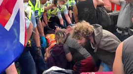 New Zealand police remove anti-vax protesters from parliament ground