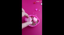 Baker makes Valentine's Day treats using marshmallows, sprinkles and chocolate