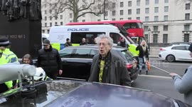 Piers Corbyn stopped by police as British 'Freedom Convoy' passes Downing Street