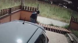 Metal gate falls on woman trying to close it in Thailand