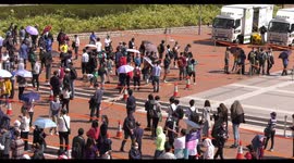 Huge testing queues in Hong Kong after record spike in daily infections