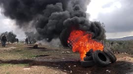 Palestinian protesters hurl stones towards Israeli security forces in West Bank village of Beita