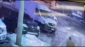 Man Walking Slips On Black Ice And Falls Over In Front Of Car