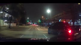 Cyclist darts in front of traffic despite having a red light