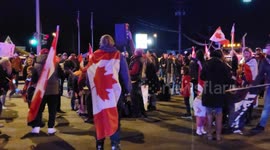 Protesters sing at 'Freedom Convoy' rally at Canadian-American border
